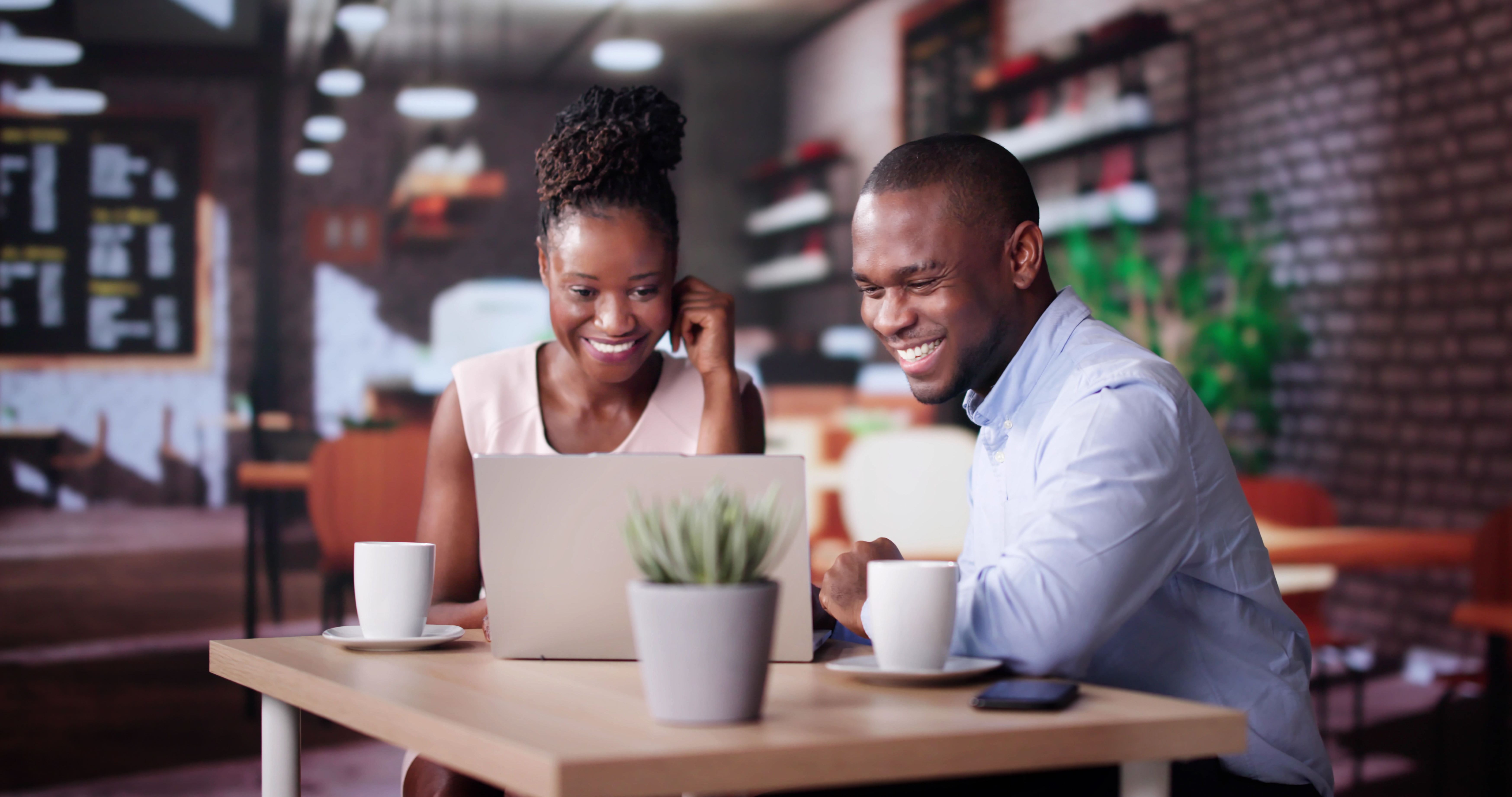 Black man and woman talking.