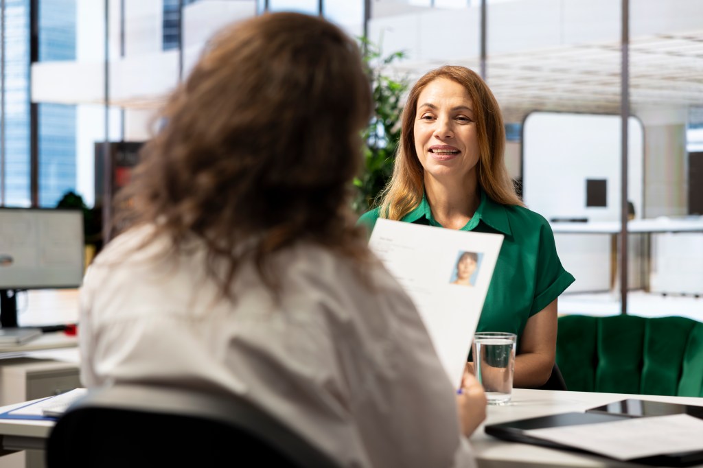 Woman sitting at desk.
